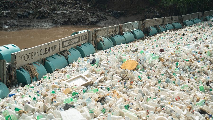 Trash accumulated against the Interceptor Barricade in Guatemala, Rio Las Vacas