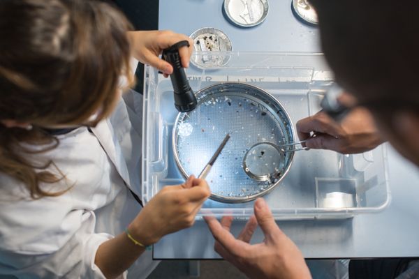The Ocean Cleanup research team processes ocean plastic samples in the laboratory.